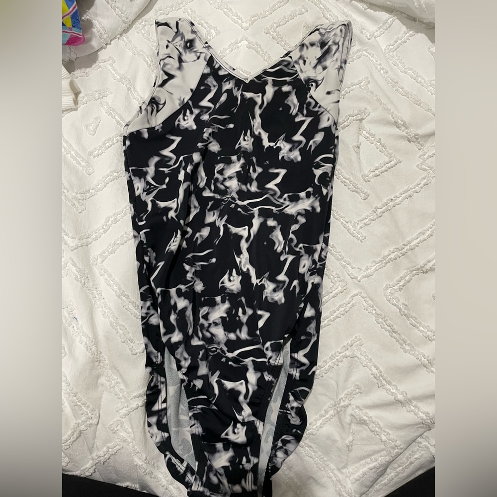 rebecca’s mom black and white leotard size as